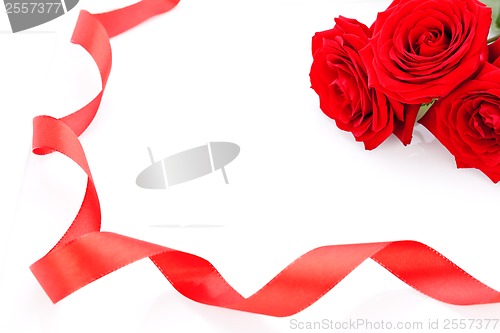 Image of Bouquet of red roses with ribbon border