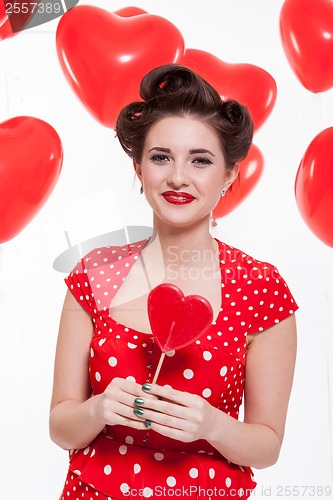 Image of Beautiful retro woman celebrating Valentines