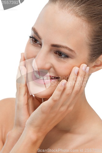 Image of beautiful young woman with perfect skin and soft makeup 