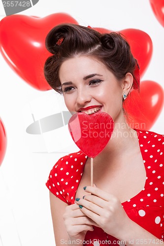 Image of Beautiful retro woman celebrating Valentines