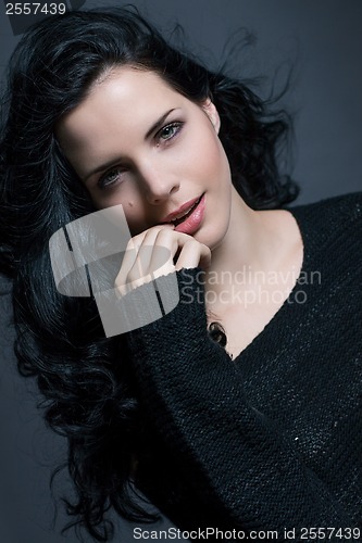 Image of Dark moody portrait of a brunette beauty