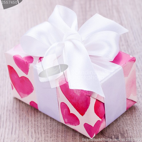 Image of Pretty Valentines gift with hearts on the giftwrap