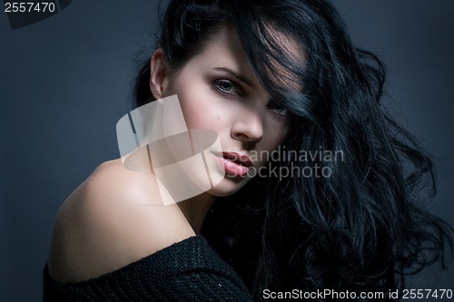 Image of Dark moody portrait of a brunette beauty