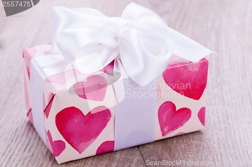 Image of Pretty Valentines gift with hearts on the giftwrap