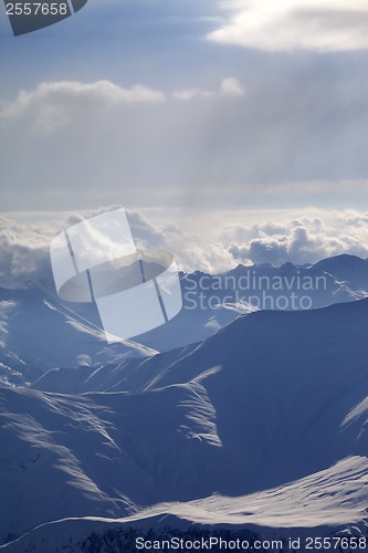 Image of Winter mountains in evening haze