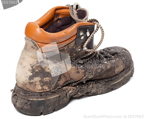 Image of Old dirty trekking boot