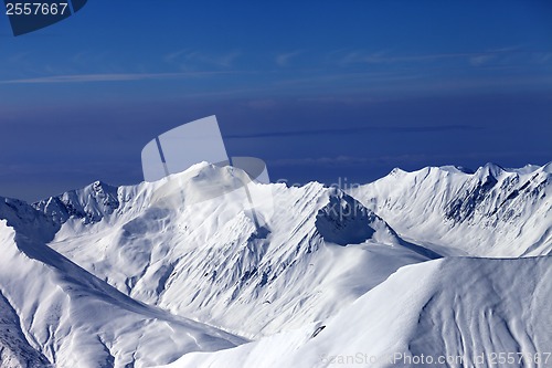 Image of View on off-piste slopes and multicolor blue sky at nice sunny e