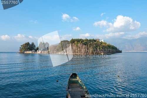 Image of Boat, village and lake