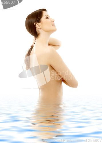 Image of topless brunette in water looking up #2