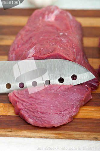 Image of raw beef cutting