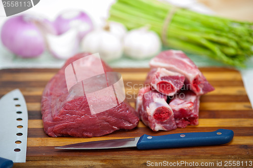 Image of raw beef and pork ribs