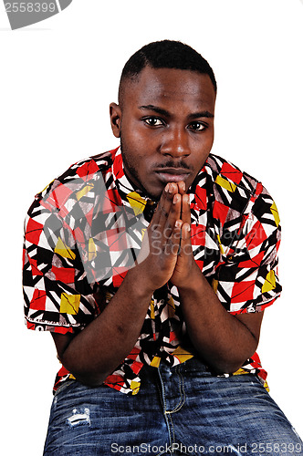 Image of Black man praying.