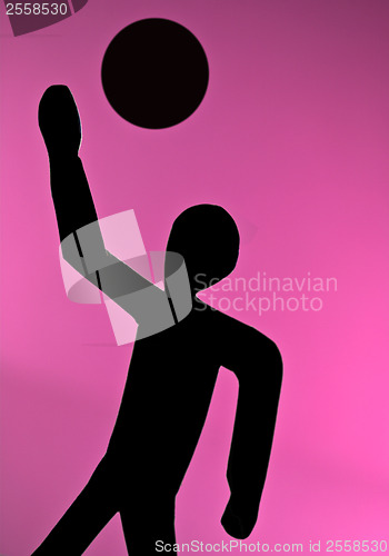 Image of People silhouette playing volleyball