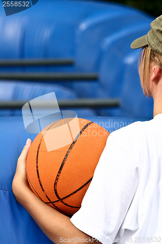 Image of Girl with basket ball in hands