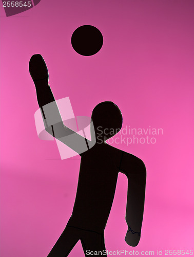 Image of People silhouette playing volleyball