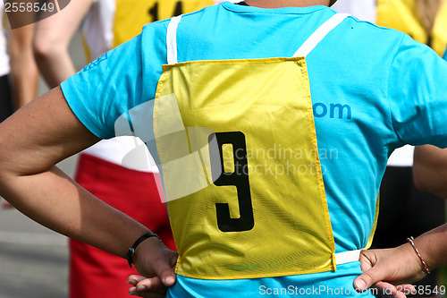 Image of Sport people with number on the back