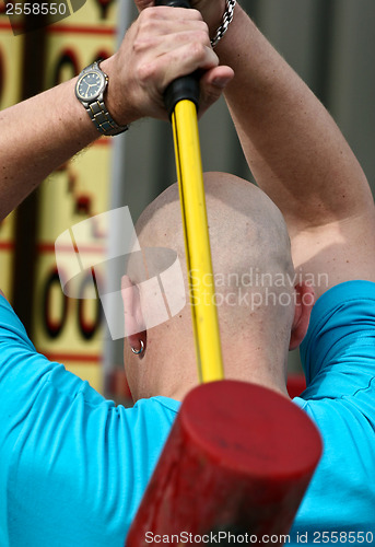 Image of Bold man with hammer