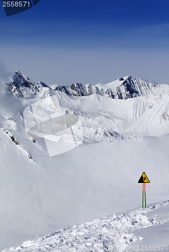 Image of Warning sing on snow slope