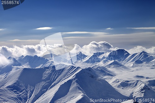 Image of Cloudy mountains at evening