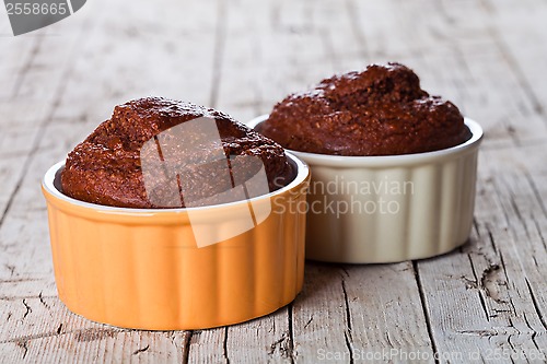 Image of two fresh baked browny cakes 