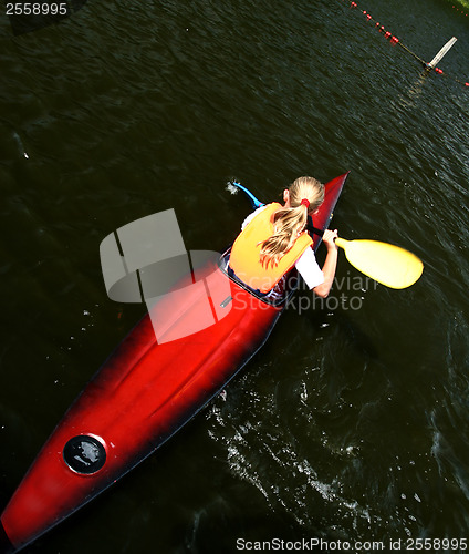 Image of Young people on kayak in denmark on a lake