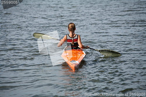 Image of Young people on kayak in denmark on a lake