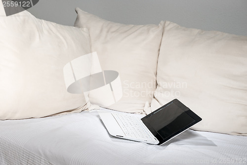Image of laptop on sofa