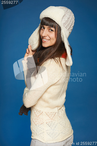 Image of Playful woman in warm clothing