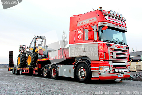 Image of Scania R500 Truck Hauling a Forest Harvester