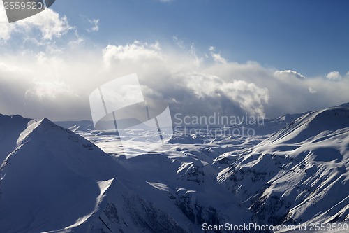 Image of Snow plateau in evening and sunlight clouds