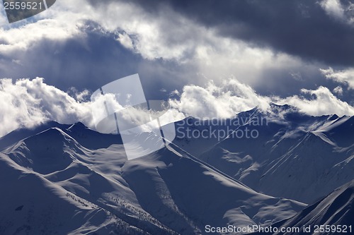 Image of Evening mountains in clouds