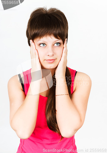Image of Headache. girl holding her head in her hands