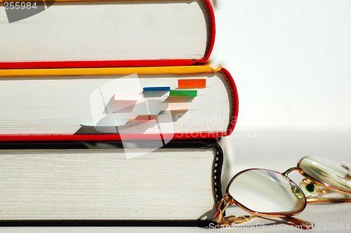 Image of Three books and glasses