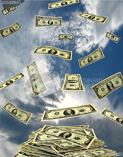 Image of dollars flying away to the heaven