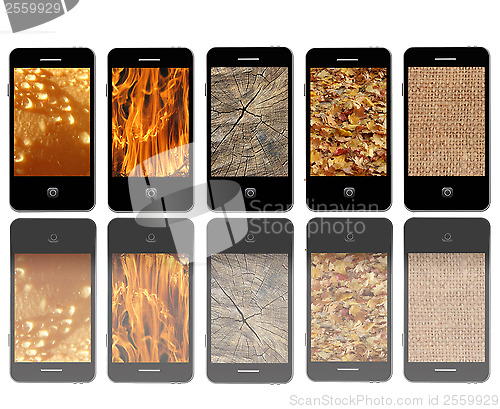 Image of Modern mobile phones with different textures