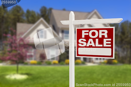 Image of Home For Sale Sign in Front of New House