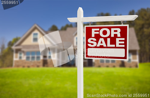 Image of Home For Sale Sign in Front of New House