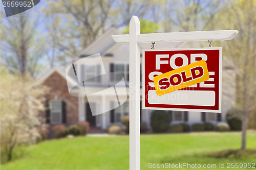 Image of Sold Home For Sale Sign in Front of New House