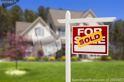 Image of Sold Home For Sale Sign in Front of New House