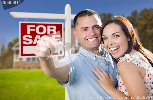 Image of Military Couple In Front of Home, House Keys and Sign