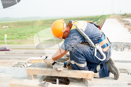 Image of Worker on bridge