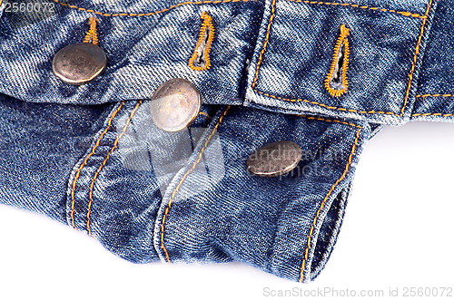 Image of Buttons on Blue Jeans
