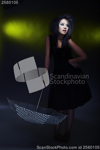 Image of Woman and umbrella
