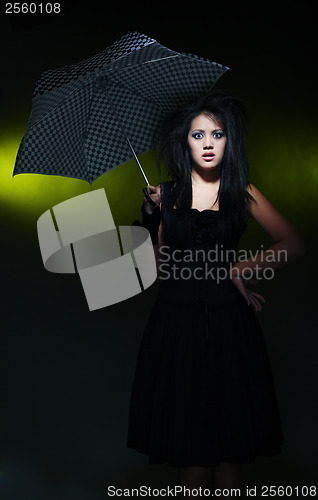 Image of Woman and umbrella