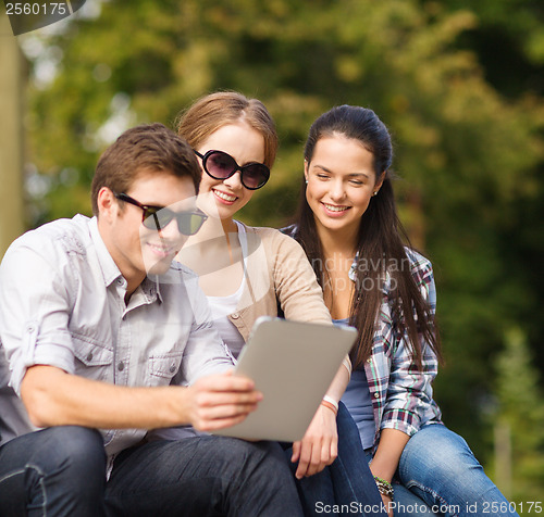 Image of students or teenagers with laptop computers