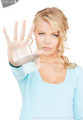 Image of woman making stop gesture