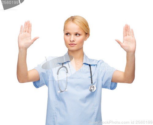 Image of doctor or nurse working with virtual screen