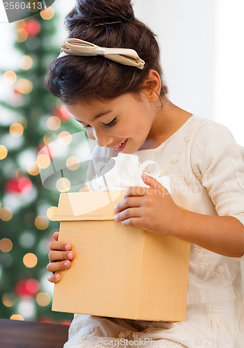 Image of happy child girl with gift box