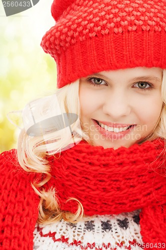 Image of teenage girl in red hat and scarf