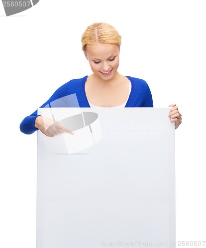 Image of woman in casual clothes with blank white board
